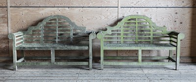 Lot 984 - A pair of Lutyens-style weathered garden benches