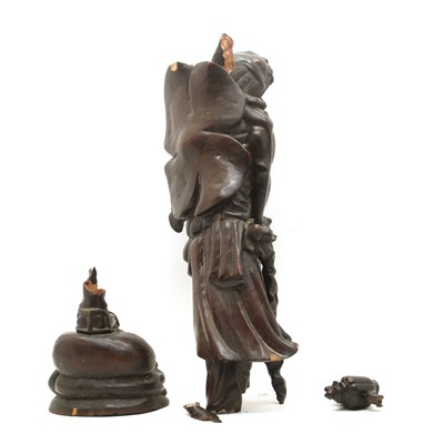 Lot 181 - A 19th century Japanese hardwood carved figure of an elder with a staff