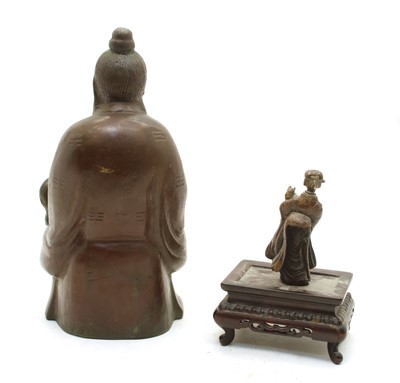 Lot 83 - A Japanese bronze figure of a seated elder