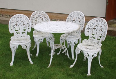 Lot 403 - A modern white painted metal garden table and four chairs