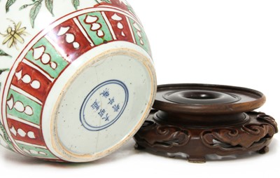 Lot 94 - A Chinese polychrome-decorated jar
