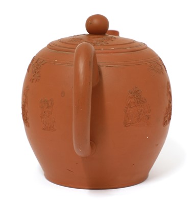 Lot 180 - A Staffordshire redware large ovoid teapot and cover