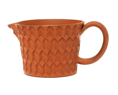 Lot 149 - A Staffordshire redware conical milk jug