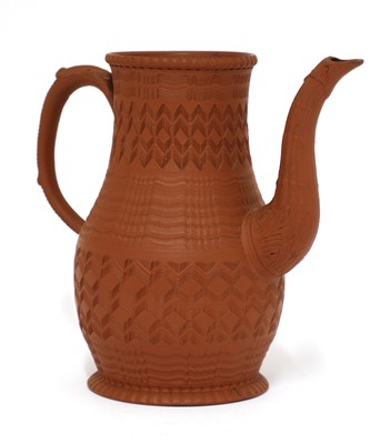 Lot 149 - A Staffordshire redware conical milk jug