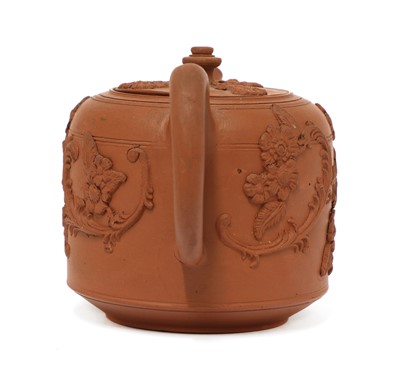 Lot 148 - A Staffordshire redware small cylindrical teapot and cover