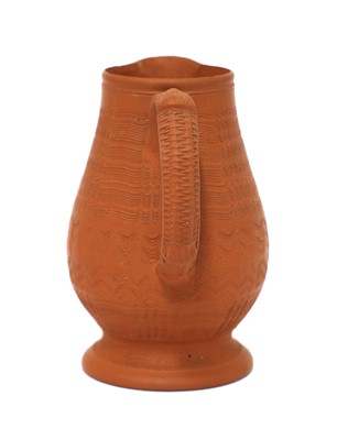 Lot 167 - A Staffordshire redware baluster-shaped milk jug