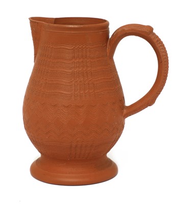 Lot 167 - A Staffordshire redware baluster-shaped milk jug