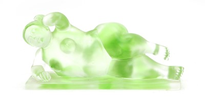 Lot 124 - A uranium style glass model of a reclining nude female