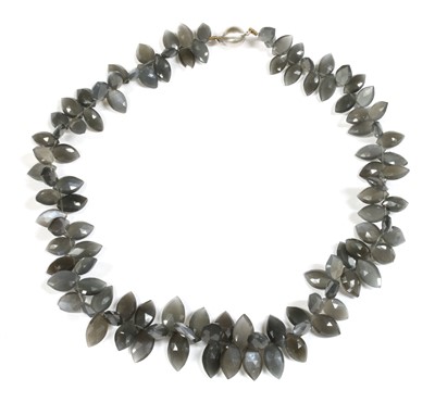 Lot 222 - A single row graduated grey moonstone bead necklace