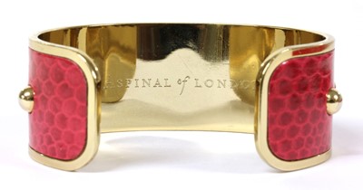 Lot 87 - A gold plated Aspinal of London lizard skin torque bangle