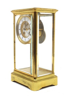 Lot 133 - A French four glass brass mantel clock
