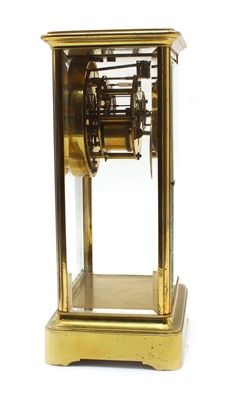 Lot 133 - A French four glass brass mantel clock