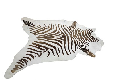 Lot 371A - A Zebra print on cow hide rug