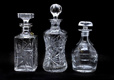 Lot 384 - Three various cut glass decanters