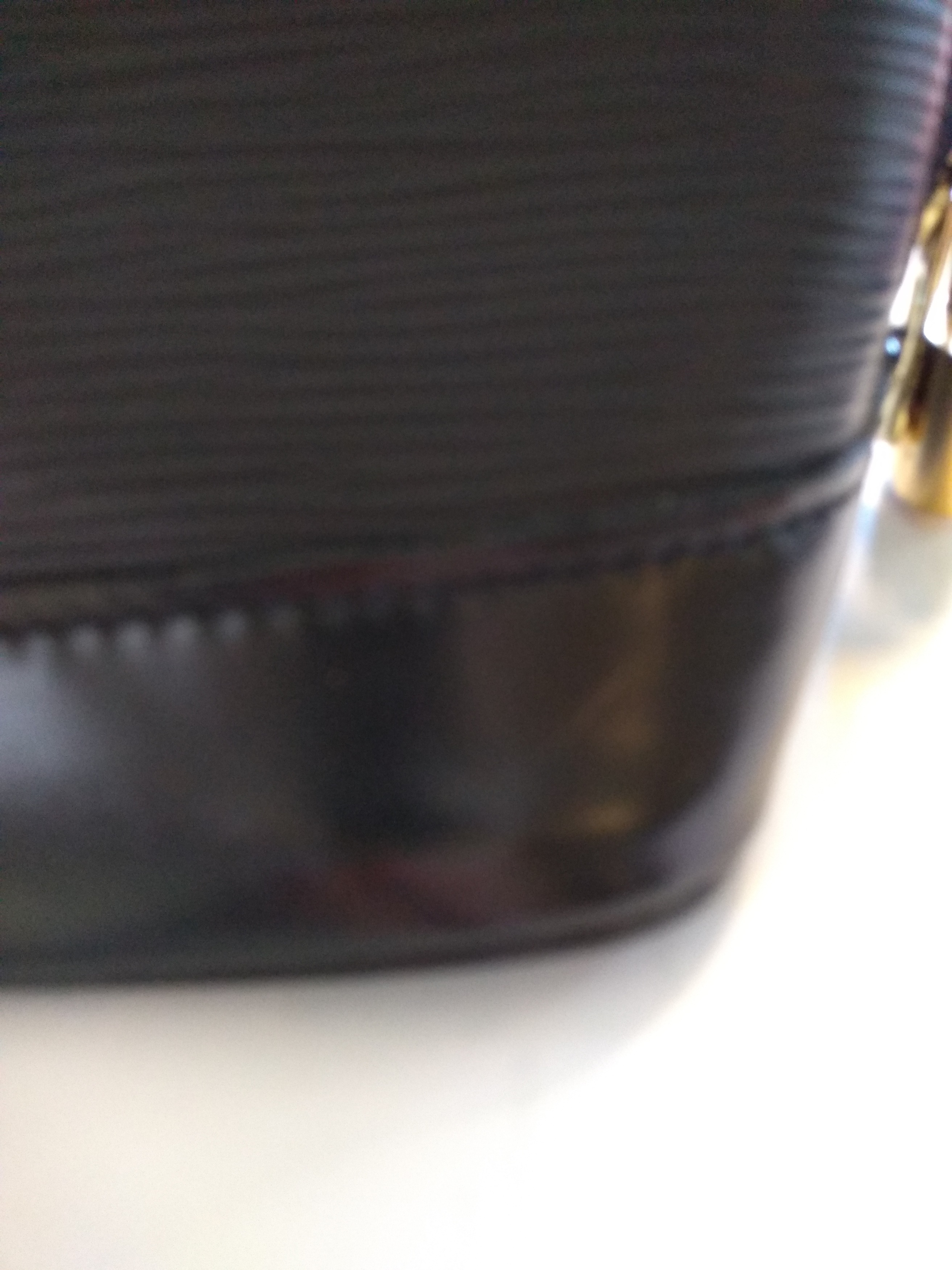 At Auction: A Louis Vuitton Black Ombre Bag. Epi leather exterior