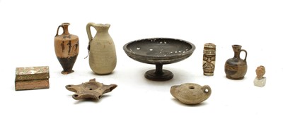 Lot 427 - A Roman oil lamp and other antiquities