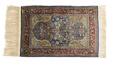 Lot 945 - A Turkish silk and metal Hereke rug