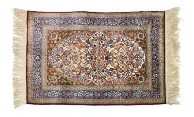 Lot 933 - A Turkish silk and metal Hereke rug