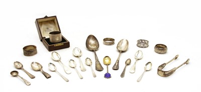Lot 319 - A collection of silver flatware and napkin rings