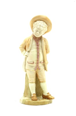 Lot 306 - A Royal Worcester figure of a young boy