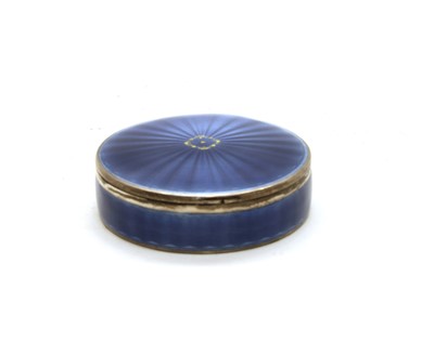 Lot 43 - A 1920s French circular lidded blue guilloche enamelled box