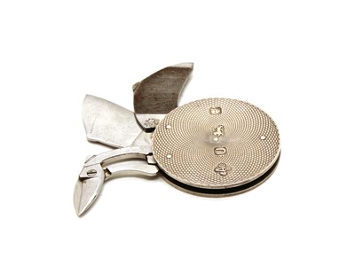 Lot 44 - A silver circular pocket etui by Asprey & Co.