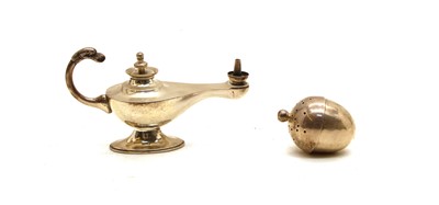 Lot 39 - An Edwardian silver 'Aladdin' lamp cigar lighter by Asprey & Co., and a pomander (2)