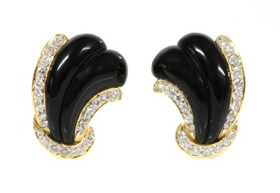 Lot 258 - A pair of onyx and diamond gold scroll or wave earrings