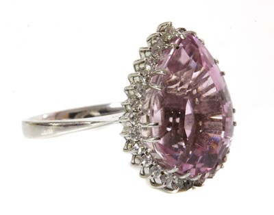 Lot 297 - A white gold kunzite and diamond pear-shaped cluster ring