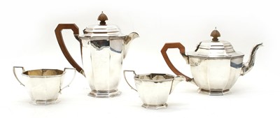 Lot 18 - A George VI silver four piece tea set, of octagonal design by Adie Bros Ltd