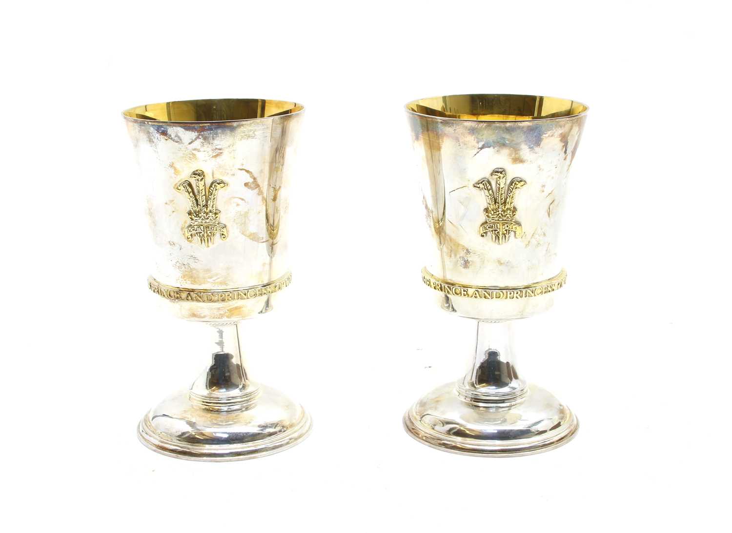 Lot 26 - A pair of sterling silver commemorative goblets, by Garrard & Co.