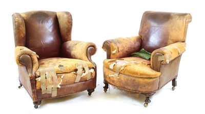 Lot 424 - A brown leather club armchair