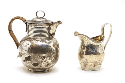 Lot 42 - A George III silver cream jug