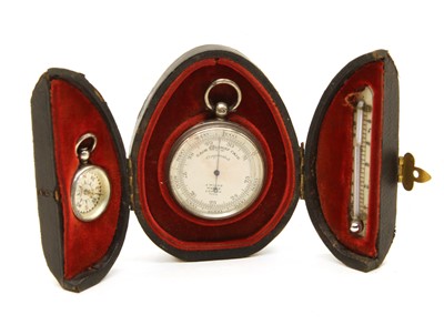 Lot 350 - A silver mounted travelling barometer, compass and thermometer