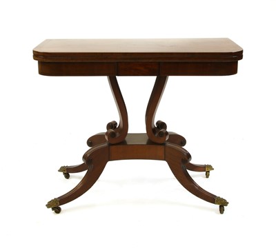 Lot 405 - A Regency strung mahogany fold-over card table