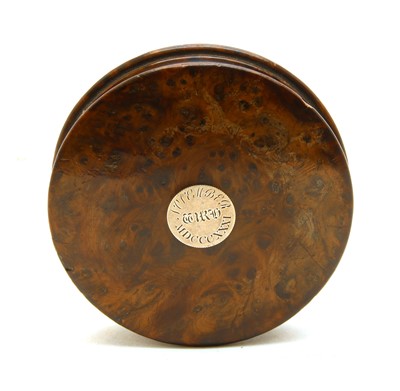Lot 134 - A 19th century burr walnut circular table top snuff mull