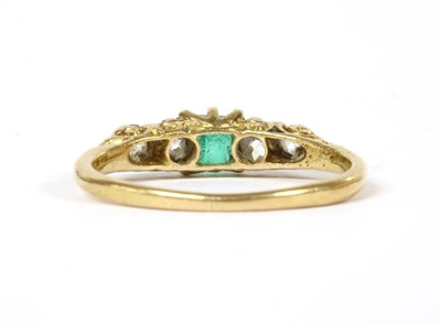 Lot 215 - A gold emerald and diamond ring