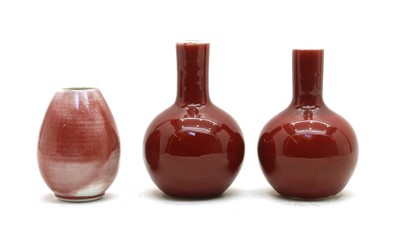 Lot 202 - Three modern Chinese red glazed vases