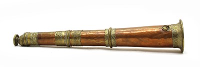 Lot 223 - A late 19th Century Tibetan long copper monastery horn