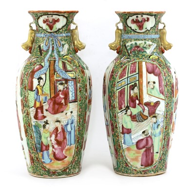 Lot 140 - A pair of Chinese Canton enamelled famille rose vases