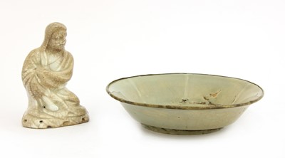 Lot 96 - A Chinese porcelain figure