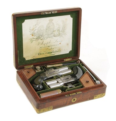Lot 775 - A cased pair of turn-over barrel percussion pistols by Joseph Lang