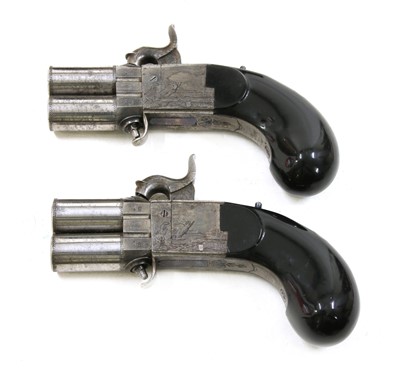 Lot 775 - A cased pair of turn-over barrel percussion pistols by Joseph Lang