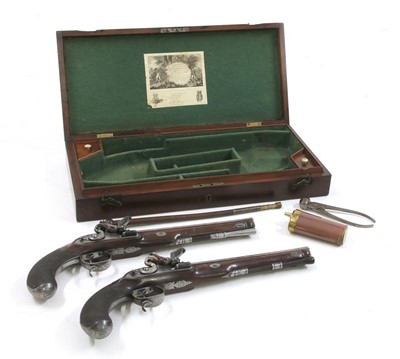 Lot 768 - A cased pair of flintlock full stock duelling pistols by P Bond
