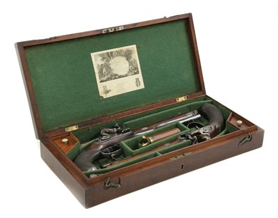 Lot 768 - A cased pair of flintlock full stock duelling pistols by P Bond