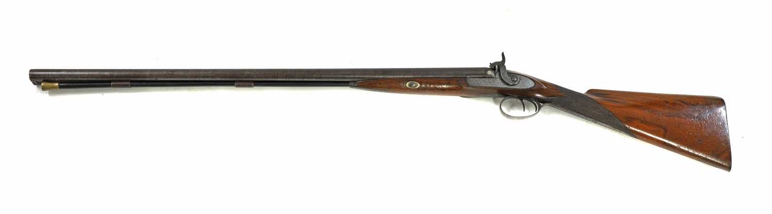 Lot 787 - A 16 bore muzzle loading double-barrelled percussion shotgun