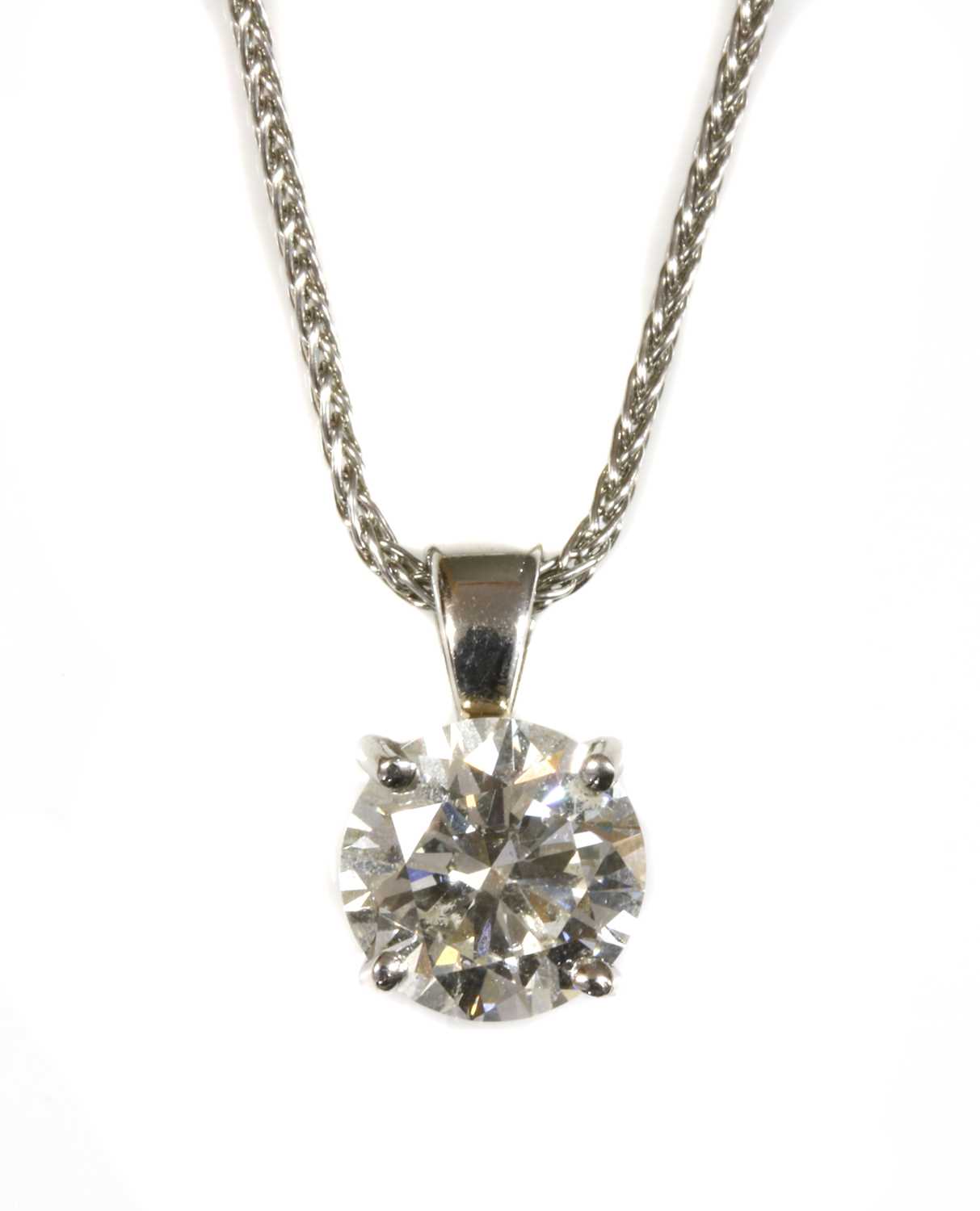 Lot 321 - A platinum single stone diamond pendant