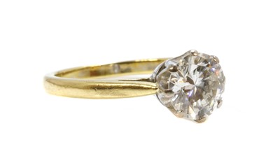 Lot 253 - An 18ct yellow and white gold single stone ring