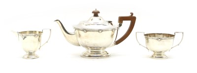 Lot 63 - A George V silver three piece tea set