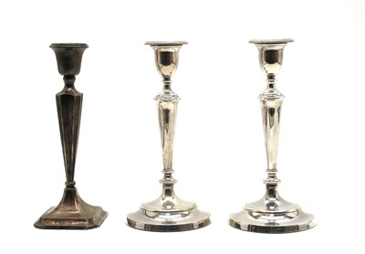 Lot 183 - A pair of silver candlesticks